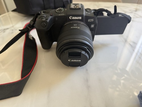 Canon eos mirrorless con - rp,